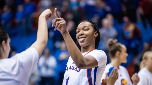 Kansas center Taiyanna Jackson celebrates with guard Holly Kersgieter during a game against the TCU Horned Frogs in Allen Fieldhouse