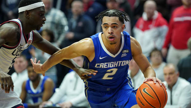 Jan 7, 2023; Storrs, Connecticut, USA; Creighton Bluejays guard Ryan Nembhard (2) drives the ball against UConn Huskies guard Hassan Diarra (5) in the second half at Harry A. Gampel Pavilion.