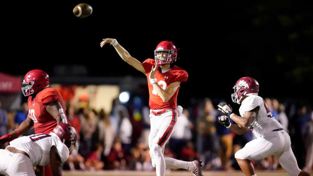 Brentwood Academy's George MacIntyre (12) throws against MBA during the second quarter at Brentwood Academy in Brentwood, Tenn., Friday, Sept. 23, 2022. Ba Mba Fb 092322 An 037