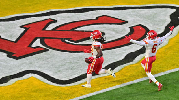 Feb 12, 2023; Glendale, Arizona, US; Kansas City Chiefs linebacker Nick Bolton (32) returns a fumble for a touchdown against the Philadelphia Eagles as Kansas City safety Bryan Cook (6) reacts during the second quarter of Super Bowl LVII at State Farm Stadium. Mandatory Credit: Matt Kartozian-USA TODAY Sports
