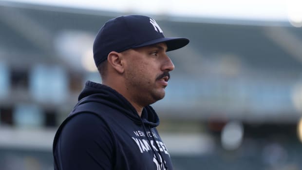 New York Yankees SP Nestor Cortes walks out of dugout
