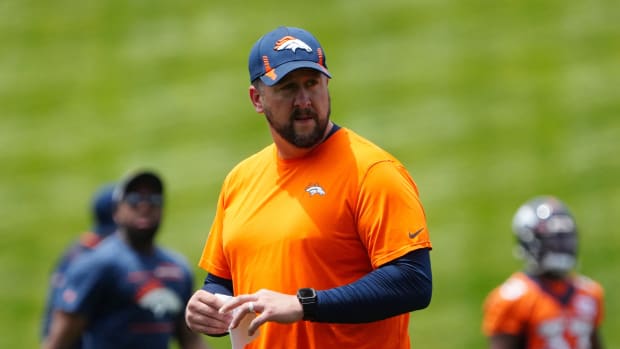 Jun 6, 2022; Englewood, Colorado, USA; Denver Broncos offensive coordinator Justin Outten during OTA workouts at the UC Health Training Center. Mandatory Credit: Ron Chenoy-USA TODAY Sports