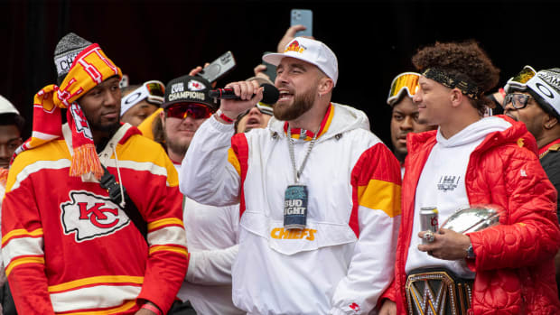 Chiefs tight end Travis Kelces makes a speech at the Super Bowl LVII Champions Parade in downtown Kansas City, Mo.