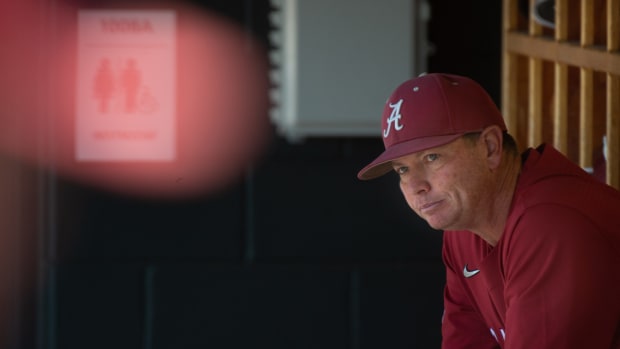 Alabama head coach Brad Bohannon sits on the bench before the game at Sewell-Thomas Stadium Sunday, April 3, 2022. The Crimson Tide defeated Texas A&M 8-4.