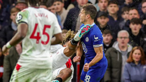 Cesar Azpilicueta pictured (right) moments after being accidentally kicked in the head by Sekou Mara during Chelsea's 1-0 loss to Southampton in February 2023