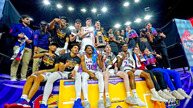 Apr 4, 2022; New Orleans, LA, USA; The Kansas Jayhawks celebrates after beating the North Carolina Tar Heels during the 2022 NCAA men's basketball tournament Final Four championship game at Caesars Superdome.