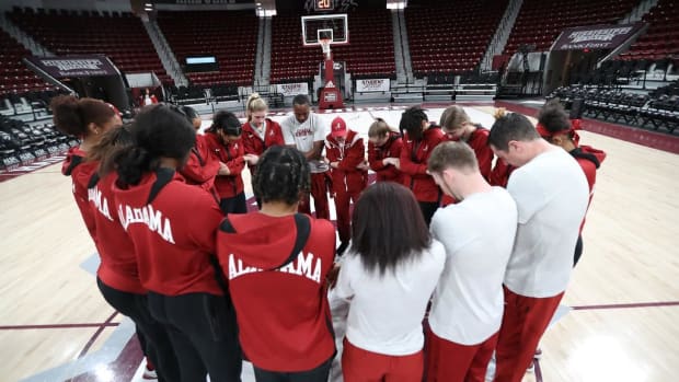 Women’s basketball team says a prayer at Humphrey Coliseum in Starkville , MS on Sunday, Feb 19, 2023.