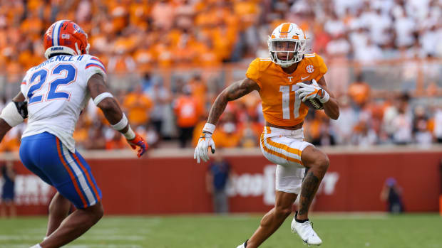 Sep 24, 2022; Knoxville, Tennessee, USA; Tennessee Volunteers wide receiver Jalin Hyatt (11) runs the ball against Florida Gators safety Rashad Torrence II (22) during the second half at Neyland Stadium. Mandatory Credit: Randy Sartin-USA TODAY Sports