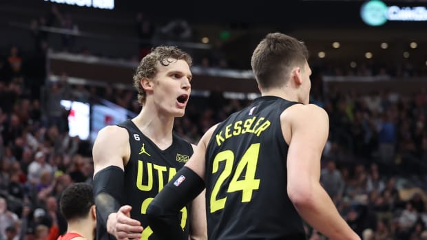 Utah Jazz forward Lauri Markkanen (23) and center Walker Kessler (24) react to a foul by the Toronto Raptors in the fourth quarter at Vivint Arena.
