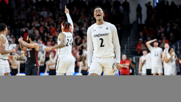 Feb 22, 2023; Cincinnati, Ohio, USA; Cincinnati Bearcats guard Landers Nolley II (2) reacts after making a basket in the game against the Temple Owls in overtime at Fifth Third Arena. Mandatory Credit: Aaron Doster-USA TODAY Sports