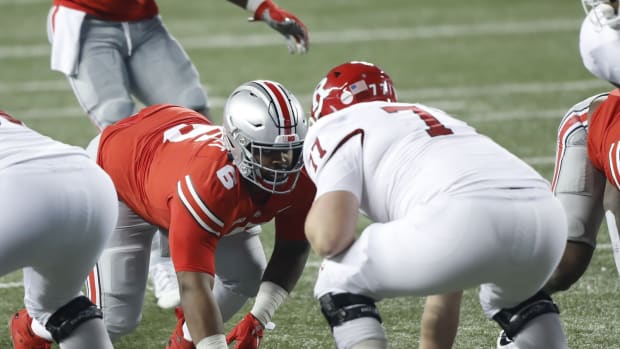 Ohio State Buckeyes defensive tackle Taron Vincent (6) lines up across from Rutgers Scarlet Knights offensive lineman Sam Vretman (77) during the third quarter of the NCAA football game at Ohio Stadium in Columbus, Ohio on Saturday, Nov. 7, 2020. Ohio State won 49-27. Ohio State Buckeyes Football Faces The Rutgers Scarlet Knights