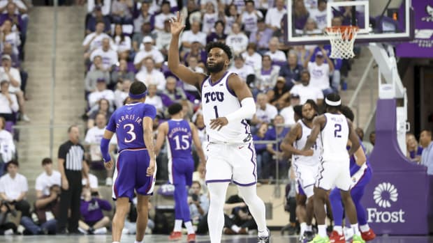 Feb 20, 2023; Fort Worth, Texas, USA; TCU Horned Frogs guard Mike Miles Jr. (1) reacts during the second half against the Kansas Jayhawks at Ed and Rae Schollmaier Arena.
