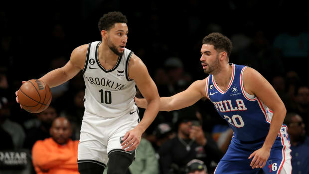 Oct 3, 2022; Brooklyn, New York, USA; Brooklyn Nets guard Ben Simmons (10) controls the ball against Philadelphia 76ers forward Georges Niang (20) during the first quarter at Barclays Center.