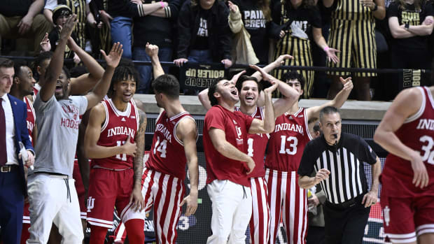 The Indiana Hoosiers bench celebrates after defeating the Purdue Boilermakers at Mackey Arena. Indiana won 79-71.