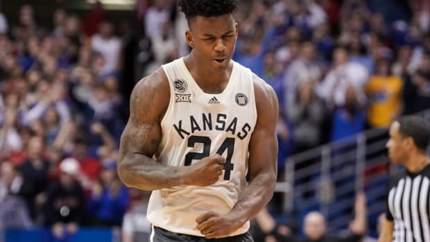 Feb 25, 2023; Lawrence, Kansas, USA; Kansas Jayhawks forward K.J. Adams Jr. (24) reacts against the West Virginia Mountaineers in the last few seconds of the game during the second half at Allen Fieldhouse.