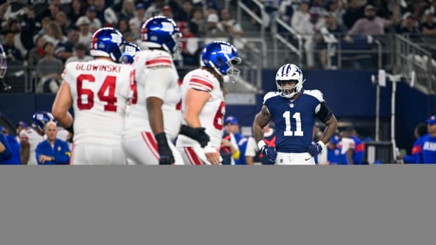 Nov 24, 2022; Arlington, Texas, USA; Dallas Cowboys linebacker Micah Parsons (11) looks at the New York Giants offensive line during the game between the Dallas Cowboys and the New York Giants at AT&T Stadium.