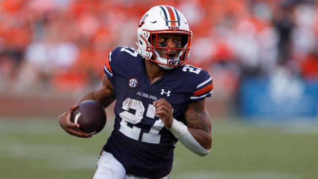 Auburn Tigers running back Jarquez Hunter on a carry during a college football game in the SEC.
