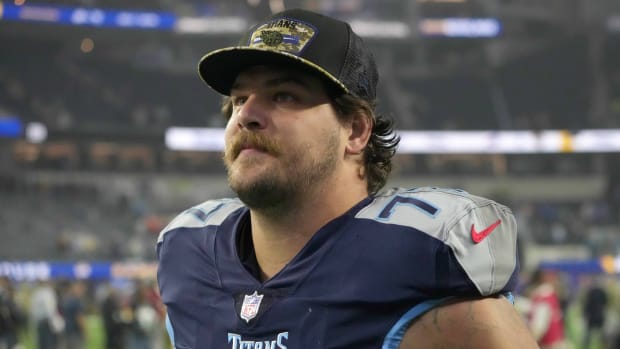 Titans offensive tackle Taylor Lewan (77) look on after a game against the Rams.