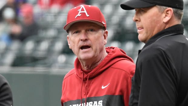 Arkansas Razorbacks coach Dave Van Horn at pregame meeting at home plate before a game with Illinois State on Wednesday.