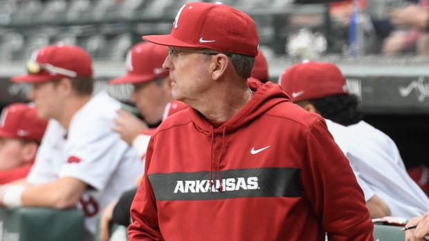 Arkansas Razorbacks coach Dave Van Horn getting a message to the fielders during a game with Illinois State on Wednesday afternoon.