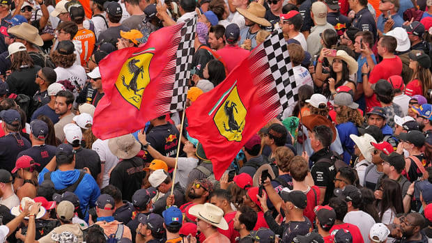 Ferrari fans wave flags at the U.S. Grand Prix in Austin.