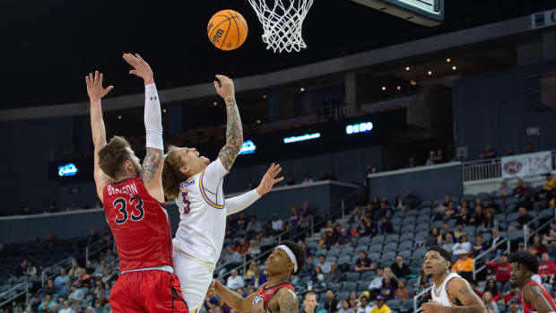 Tennessee Tech s Brett Thompson (5) leaps for a shot against the Southeast Missouri State University Redhawks during the OVC men’s championship at Ford Center on Saturday, March 4, 2023. Ns Semo Ttu 030423 0215