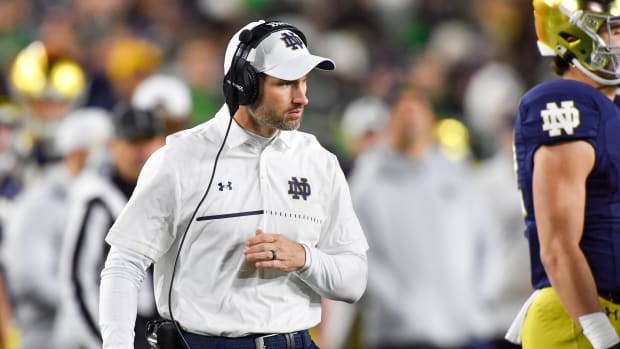 Nov 5, 2022; South Bend, Indiana, USA; Notre Dame Fighting Irish special teams coordinator Brian Mason watches in the first quarter against the Clemson Tigers at Notre Dame Stadium.