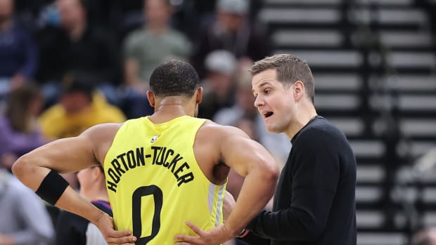 Utah Jazz guard Talen Horton-Tucker (0) speaks with head coach Will Hardy during a break against the San Antonio Spurs in the first quarter at Vivint Arena.