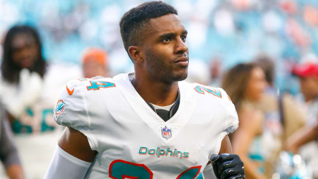 Dolphins cornerback Byron Jones runs off the field after a game.