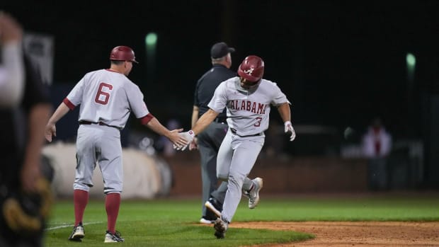 Alabama catcher Dominic Tamez (3) runs around the bases after hitting a home run in the Crimson Tide's 11-6 win over the Samford Bulldogs on March 7, 2023 at Joe Lee Griffin Field in Birmingham, Ala.