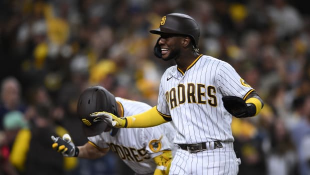 Oct 15, 2022; San Diego, California, USA; San Diego Padres left fielder Jurickson Profar (10) reacts after scoring a run in the seventh inning against the Los Angeles Dodgers during game four of the NLDS for the 2022 MLB Playoffs at Petco Park.