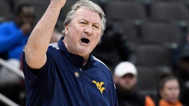 West Virginia's head coach Bob Huggins gestures during the first round of the Big 12 basketball game against Texas Tech, Wednesday, March 8, 2023, at T-Mobile Center in Kansas City.