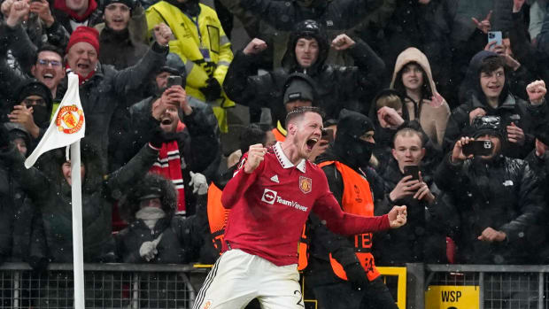 Wout Weghorst pictured celebrating after scoring at Old Trafford for the first time in March 2023