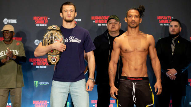 Usman Nurmagomedov and Benson Henderson at the weigh-in before their main event fight at Bellator 292.