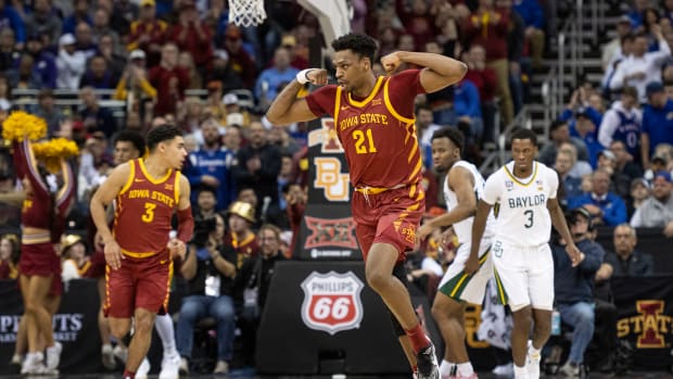 Mar 9, 2023; Kansas City, MO, USA; Iowa State Cyclones center Osun Osunniyi (21) celebrates after a play against the Baylor Bears in the second half at T-Mobile Center.