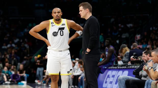 Utah Jazz guard Talen Horton-Tucker (0) listens to head coach Will Hardy during the second half against the Charlotte Hornets at Spectrum Center.