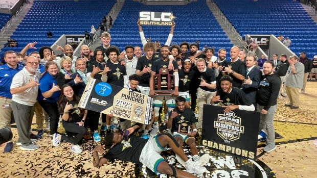 Texas A&M-Corpus Christi men’s basketball players and coaches celebrate after winning the Southland Conference Tournament championship on Wednesday, March 8, 2023 in Lake Charles, La. Img 1426