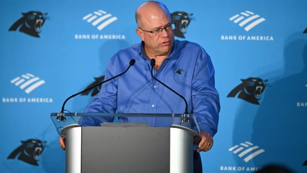 Panthers owner David Tepper speaks with the media at a press conference.