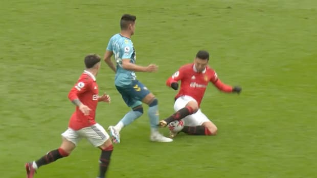 Casemiro pictured (right) fouling Carlos Alcaraz during Manchester United's 0-0 draw with Southampton in March 2023