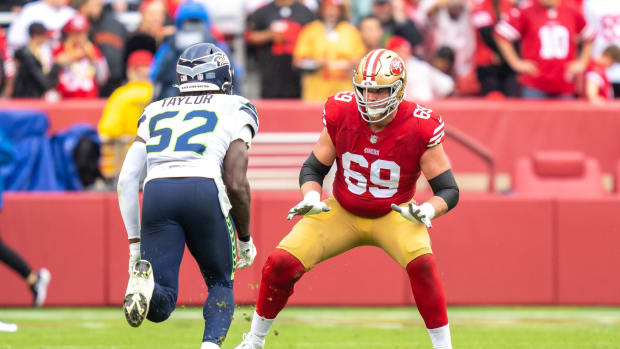 September 18, 2022; Santa Clara, California, USA; San Francisco 49ers offensive tackle Mike McGlinchey (69) blocks Seattle Seahawks defensive end Darrell Taylor (52) during the third quarter at Levi's Stadium.