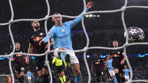 Erling Haaland pictured scoring one of his FIVE goals during Manchester City's 7-0 win over RB Leipzig in March 2023