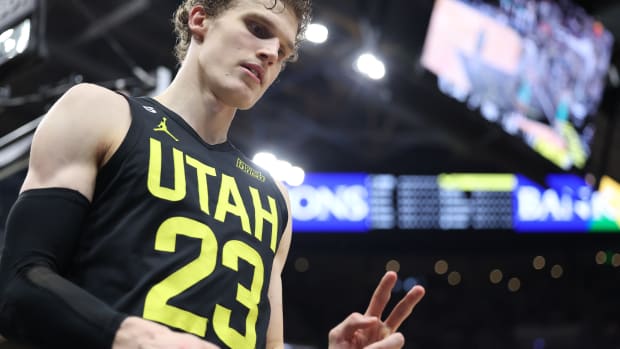 Utah Jazz forward Lauri Markkanen (23) reacts after a play against the San Antonio Spurs in the second half at Vivint Arena.