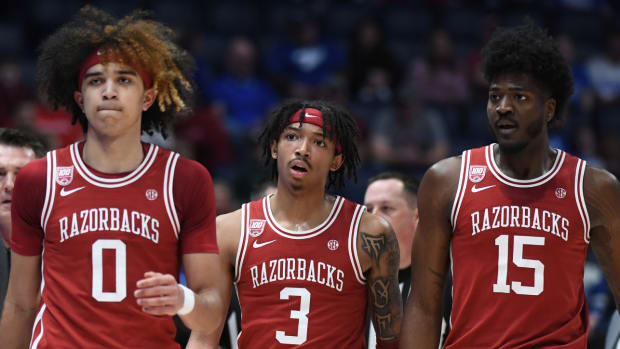 Arkansas men’s basketball players Anthony Black, Nick Smith Jr. and Makhi Mitchell play during the 2023 SEC tournament.