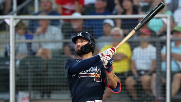 Mar 7, 2023; North Port, Florida, USA; Atlanta Braves outfielder Kevin Pillar (17) hits a home run during the third inning against the Boston Red Sox at CoolToday Park.