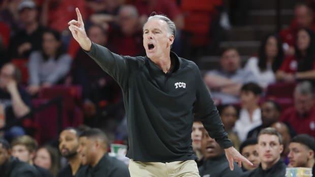 Mar 4, 2023; Norman, Oklahoma, USA; TCU Horned Frogs head coach Jamie Dixon gestures to his team as they play against the Oklahoma Sooners during the second half at Lloyd Noble Center. Oklahoma won 74-60.