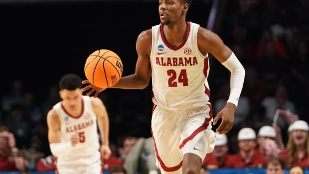 Mar 16, 2023; Birmingham, AL, USA; Alabama Crimson Tide forward Brandon Miller (24) brings the ball up against the Texas A&M-CC Islanders during the first half in the first round of the 2023 NCAA Tournament at Legacy Arena. Mandatory Credit: Marvin Gentry-USA TODAY Sports