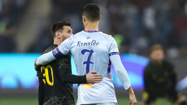 Lionel Messi (left) and Cristiano Ronaldo pictured embracing during a friendly game between PSG and a Saudi Pro League all-star XI in January 2023