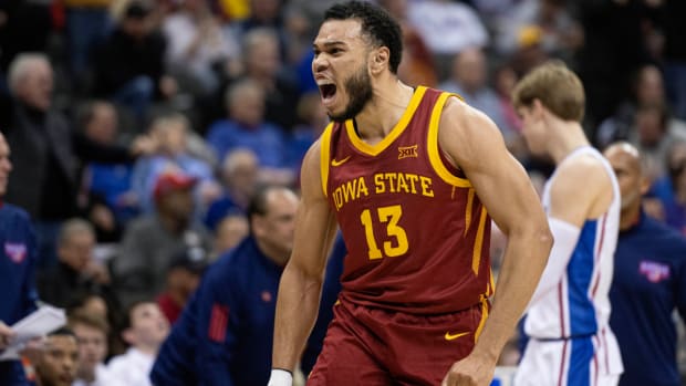 Mar 10, 2023; Kansas City, MO, USA; Iowa State Cyclones guard Jaren Holmes (13) celebrates after a play against the Kansas Jayhawks in the second half at T-Mobile Center. Mandatory Credit: Amy Kontras-USA TODAY Sports