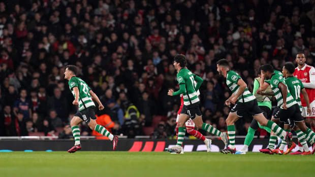 Sporting Lisbon players pictured celebrating after Pedro Goncalves (left) scored against Arsenal from the halfway line in a Europa League game in March 2023