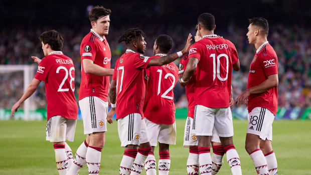 Manchester United players pictured celebrating during their 1-0 win over Real Betis in the 2022/23 Europa League